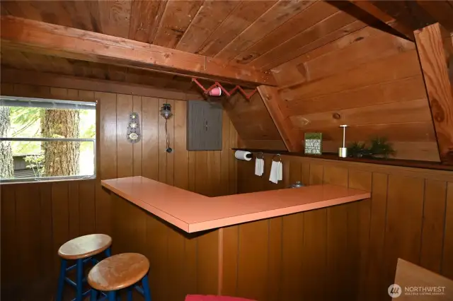 Wet bar for serving up food and drinks.