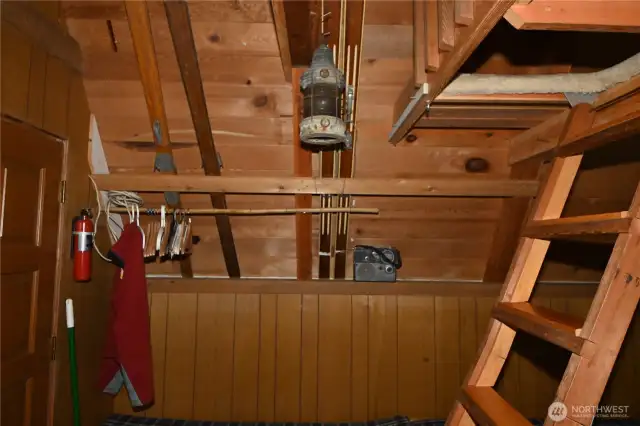 Skis can be easily tucked out of the way ~ brilliant use of space.
