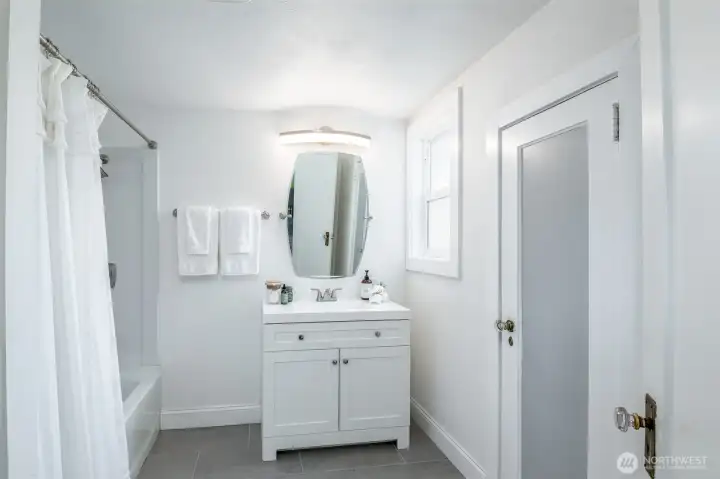 This updated bathroom feels so clean and fresh