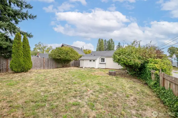 This yard is a blank canvas - add a fire pit, trampoline, gazebo or garden boxes - lots of room to make it your own!