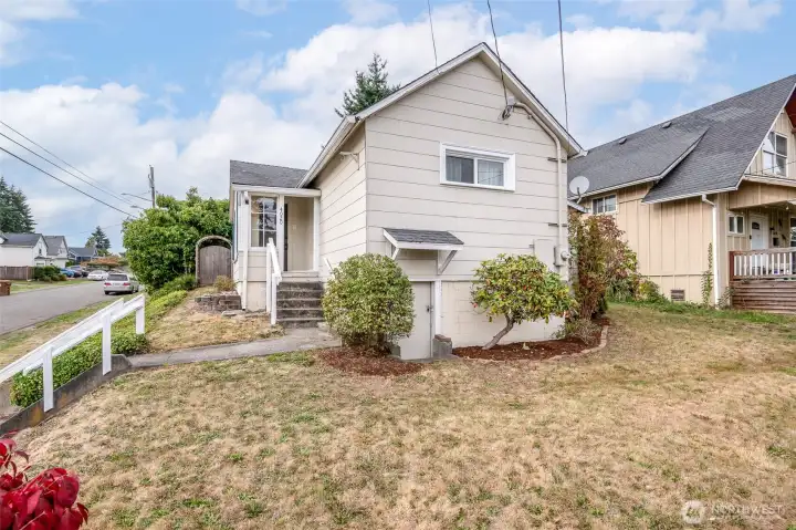 The home, sitting above the street, adds plenty of natural light throughout.