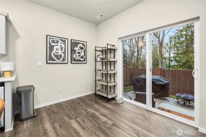 Dining room with greenbelt views