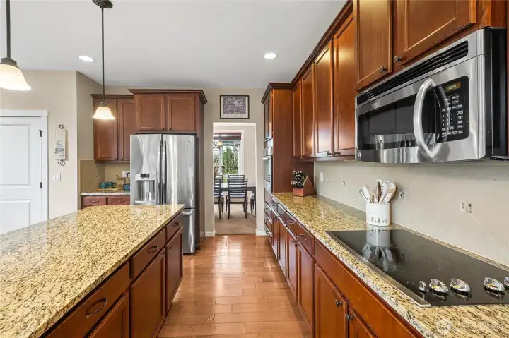 A large step-in pantry provides abundant storage, keeping everything organized and within reach. Ideal for stocking up and staying clutter-free.