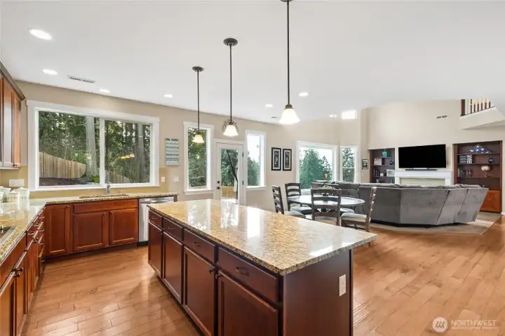 Stainless steel appliances complete the kitchen, offering both style and performance. A perfect setup for home chefs and entertainers alike.