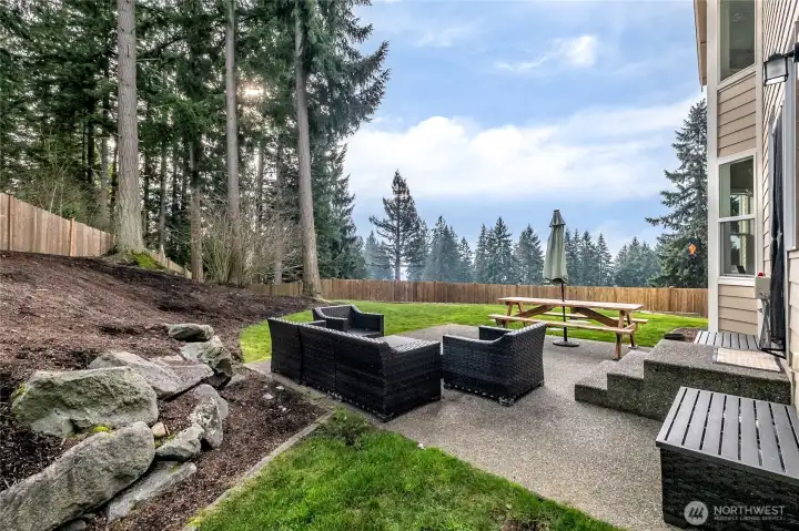 The private backyard provides a peaceful retreat, surrounded by territorial views. Ideal for outdoor living and quiet evenings.