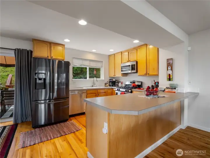 The large peninsula is great when you need counterspace for projects, Baking or Cooking.