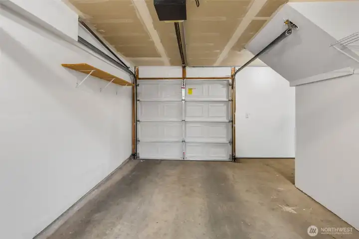 One car attached garage with extra storage