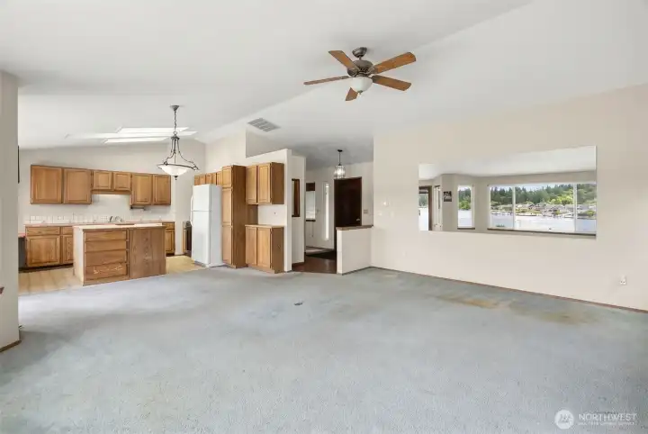 Living room to kitchen and entrance Living room to kitchen and entrance