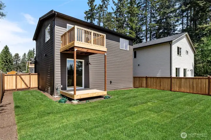 Two Decks and large Backyard.