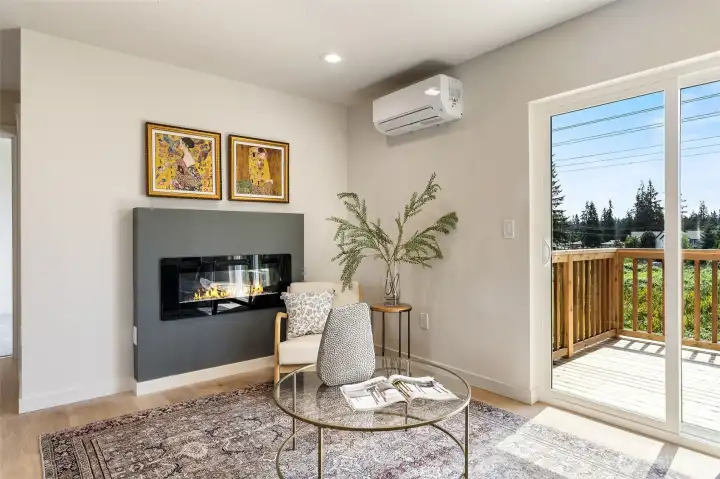 Great Room with Fireplace and Deck Access