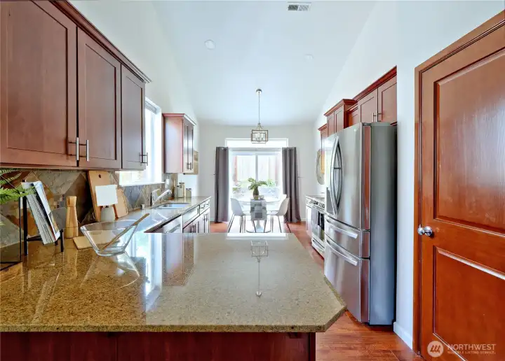 Kitchen with eating area and sliders to patio
