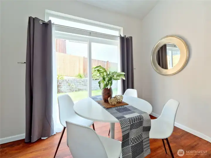 Kitchen eating area opens to patio