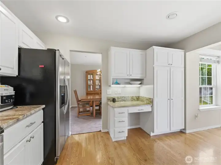 Well-appointed kitchen with durable granite surfaces and convenient access to dining areas.
