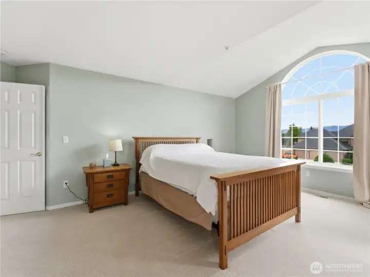 Large primary suite offering privacy, comfort, and a relaxing atmosphere.