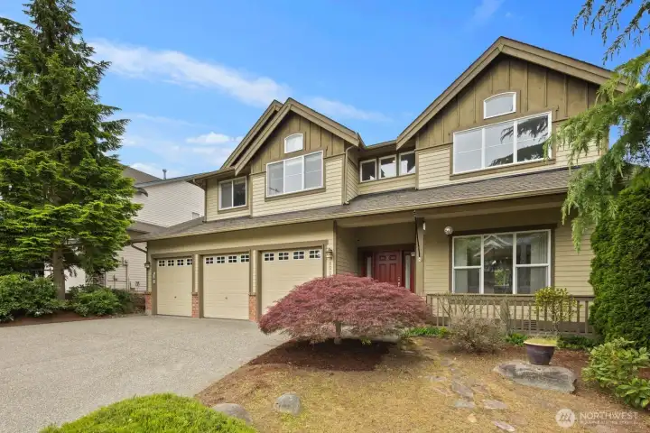 Covered front entry surrounded by mature landscaping and outdoor space. Covered front entry surrounded by mature landscaping and outdoor space.