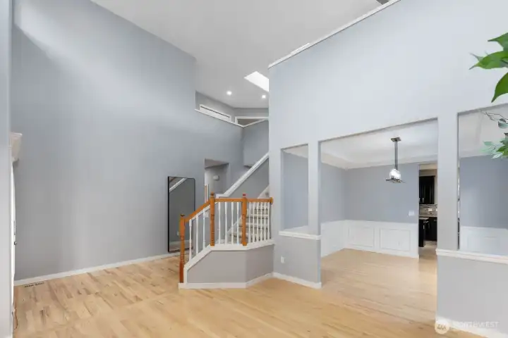 Open sightlines and vaulted ceilings create a bright, spacious feel throughout the main living areas. Open sightlines and vaulted ceilings create a bright, spacious feel throughout the main living areas.