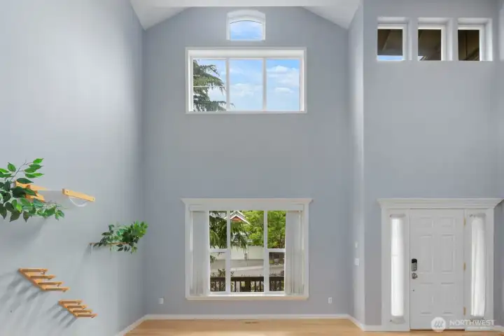 Natural light and vertical space take center stage in this impressive gathering area. Natural light and vertical space take center stage in this impressive gathering area.
