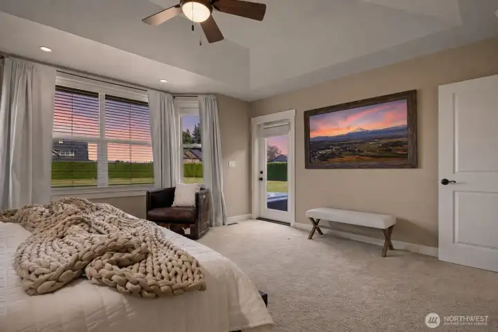 The primary bedroom opens directly to the patio and hot tub.