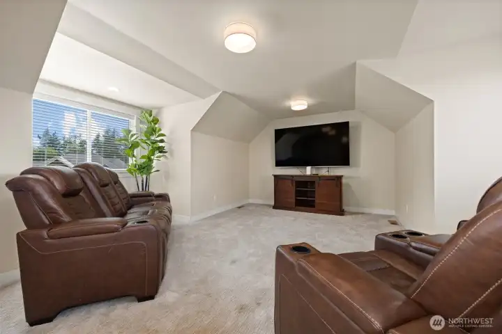 Upper level rec room - it has a closet and can be a potential 4th bedroom