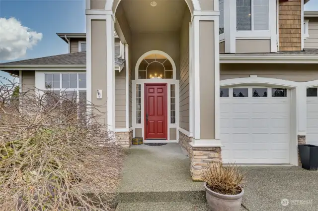 Covered front entry to home.