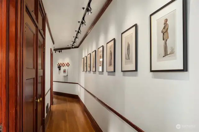 Long hallway with ample storage.