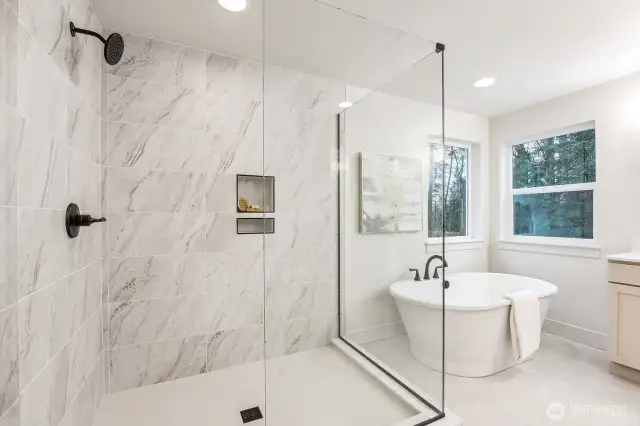 Luxurious primary spa like bath. Photos are of the Magnolia model home at Maywood Heights on lot 8. Photos are for illustration purposes only; colors and finishes will vary.