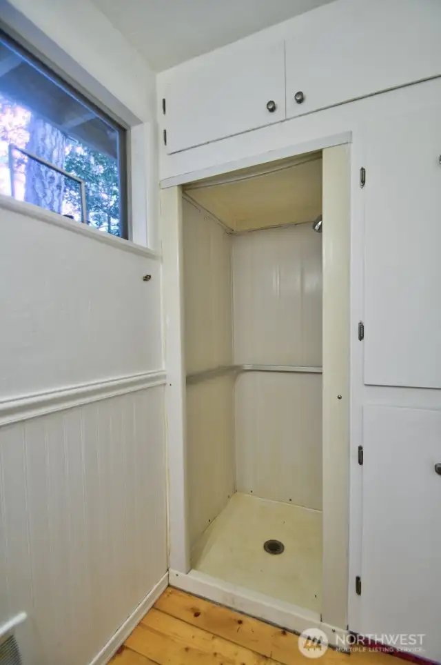 Shower Stall in the Bath with storage.