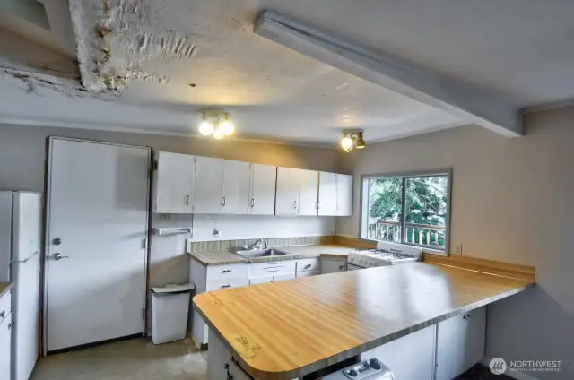 Ceiling has damage from skylight.