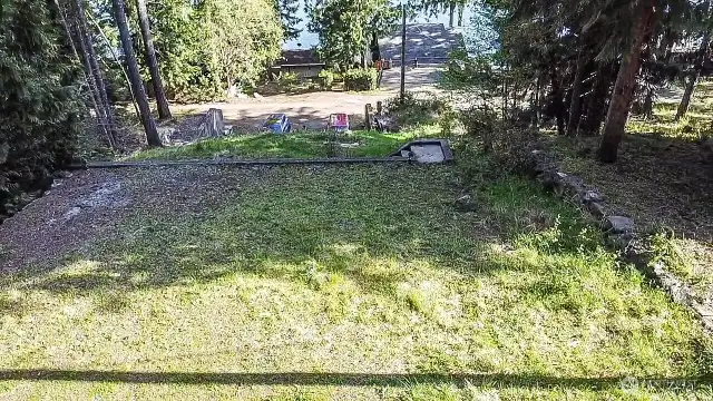 Off street pad for overflow or trailer storage.