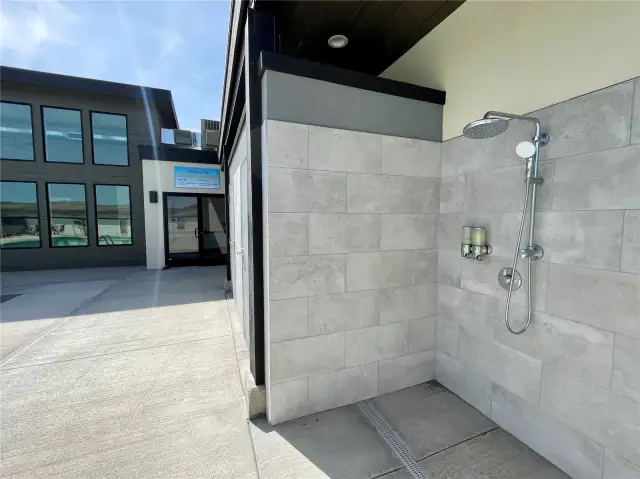 Outdoor and indoor showers at the clubhouse