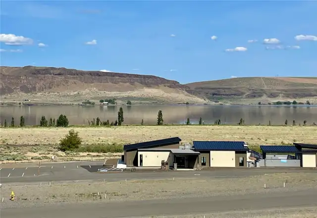 View from ground level looking east toward the river and clubhouse