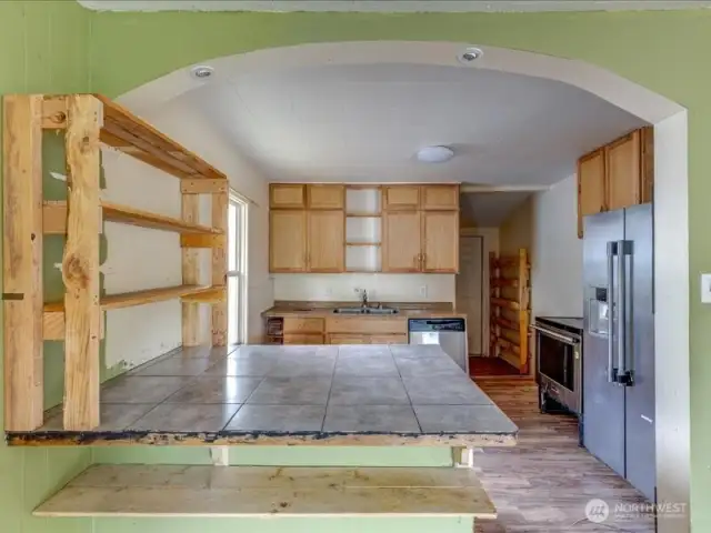 Living Room and Kitchen Eating Area.