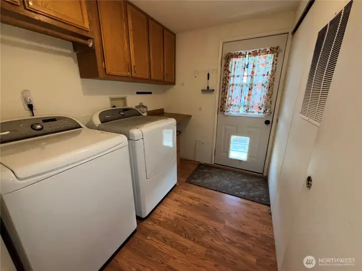 Laundry room out to the back deck.