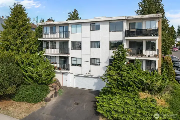 Sunset Villa community with secure entry and covered garage parking