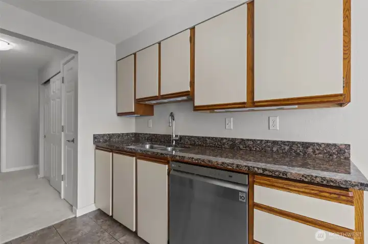 Functional kitchen design with breakfast bar and space for casual dining