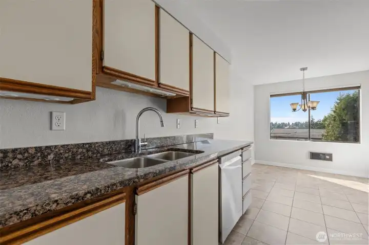Functional kitchen design with breakfast bar and space for casual dining