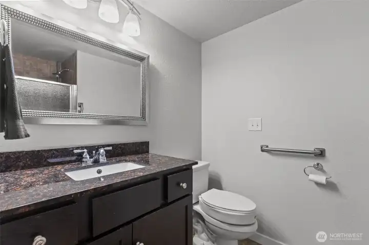 Convenient ensuite bath in the primary bedroom for privacy and comfort
