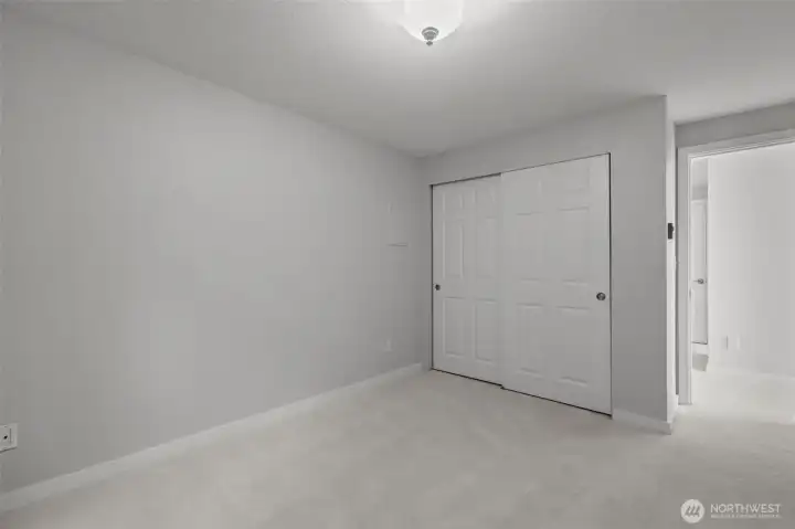 Second bedroom perfect for guests, office, or flexible use