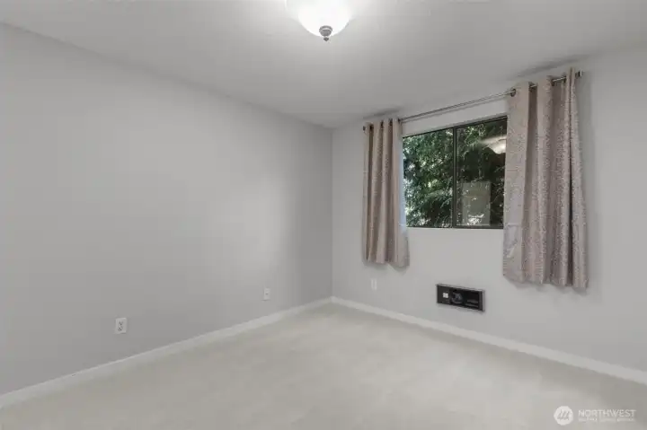 Second bedroom perfect for guests, office, or flexible use