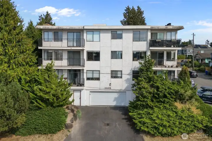 Sunset Villa community with secure entry and covered garage parking