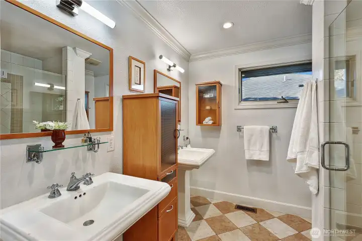 Main floor 3/4 bathroom features double vanity