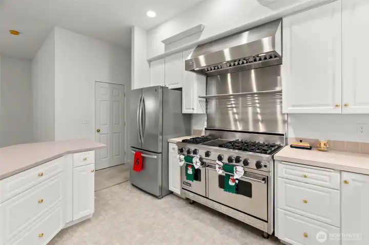 "Wolf" stainless Double Oven and stainless Refrigerator /Freezer