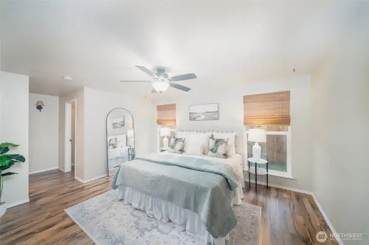 Primary Bedroom with 3/4 bath and walk in closet.