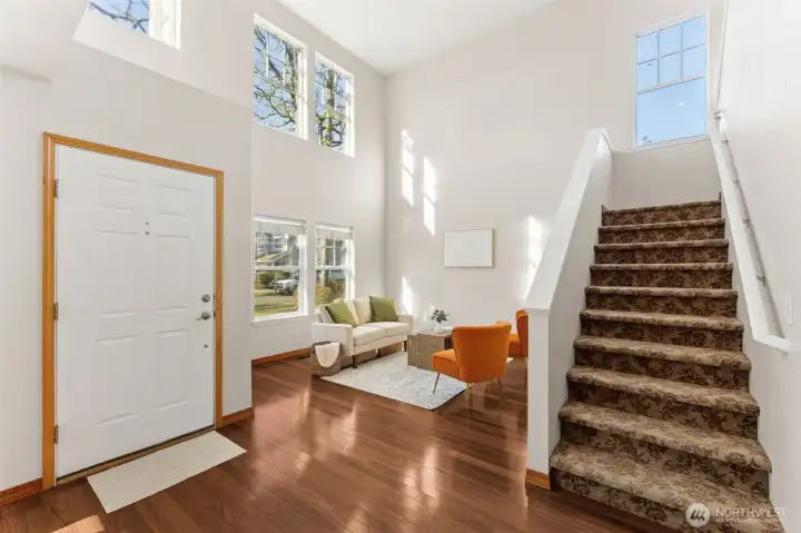 Vaulted ceilings and hardwood floors welcome you to this 1800+ SF home.