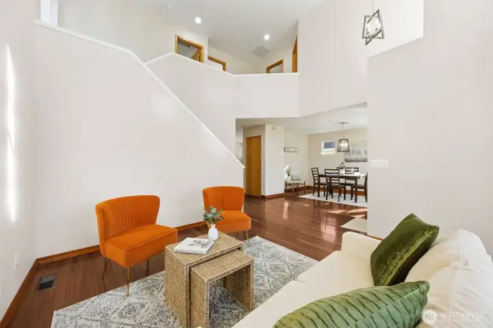 Hardwood floors throughout downstairs living, family and dining room.