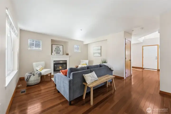 Family room off kitchen with gas fireplace.