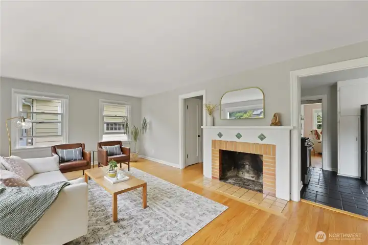 Recently refinished hardwood floors, fresh paint, and an abundance of natural light.