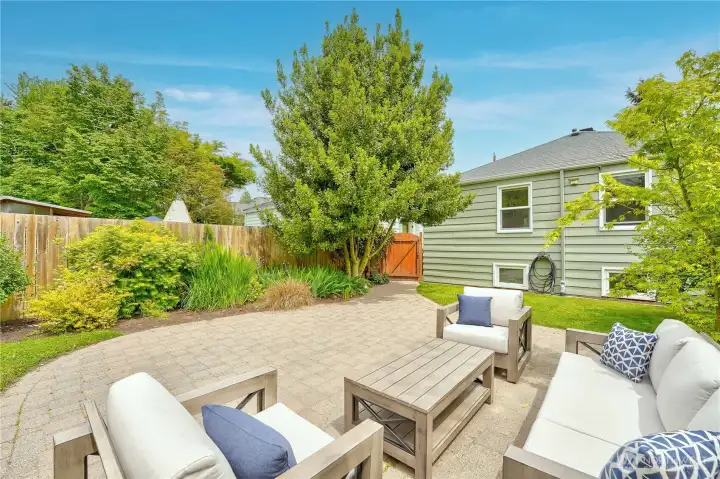 The incredible backyard is fully landscaped, perfect for relaxing or entertaining.