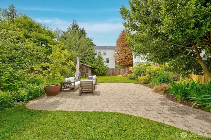 The incredible backyard is fully landscaped, perfect for relaxing or entertaining.
