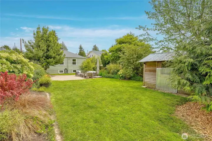 The incredible backyard is fully landscaped, perfect for relaxing or entertaining.